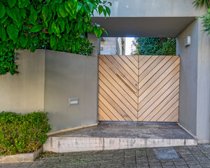 modern family house main entrance natural wood door