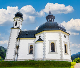 The Seekirchl also Heiligkreuzkirche is a famous landmark of Seefeld in Tirol Austria