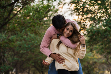 Happy young couple enjoying sunset walk. lifestyle concept