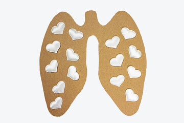 Paper lungs on a white background with white hearts.