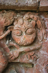 Fototapeta na wymiar Carved terracotta plaque representing lion on UNESCO World Heritage site old Somapura Mahavihara better known as Paharpur buddhist monastery in Naogaon, Bangladesh
