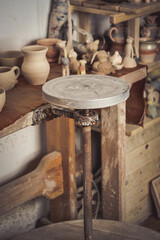 Pottery studio, empty potter's wheel, pottery from clay