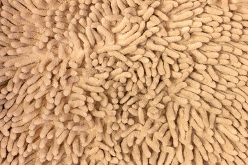 The structure of a soft light carpet with a thick fluffy pile.