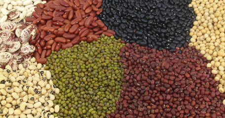 Assortment of different beans as background.