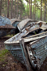Fototapeta na wymiar An old abandoned wooden boat.