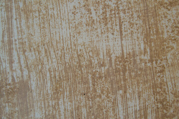 drawing on a concrete wall after applying a primer