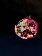 pomegranate isolated on black
