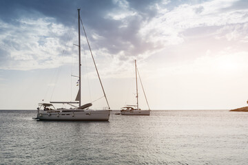 luxury  big white sailing yachts at the sea