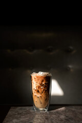 glass of coffee with milk on the table