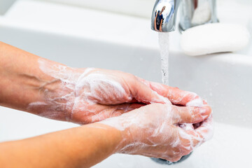 Washing hands using medical instructions to protect against viruses step by step. Coronavirus...