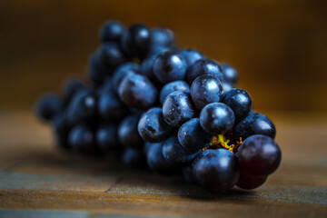 Fresh grapes on a wooden table