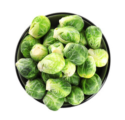 Fresh Brussels sprouts in bowl isolated on white, top view
