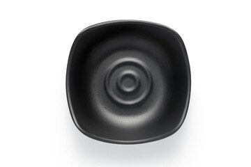 Black ceramic dish isolated on white background. Top view.