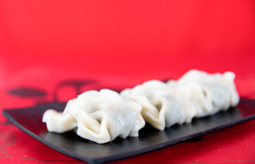 A plate of dumplings on the Red Spring Festival couplets
