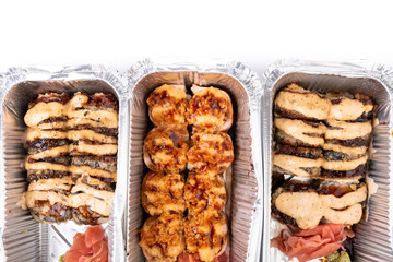 hot sushi roll with grilled cheese in foil