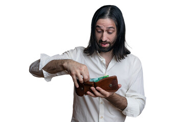 A man with long hair and a beard in a white shirt with an open wallet in his hands on a white background. Manifestation of various emotions. 