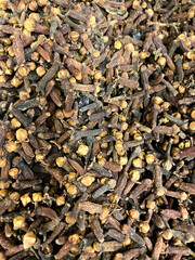 Cloves spice on the market in Turkey. Overhead view of dry seasoning