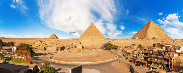 Giza panorama with the Great Sphinx near the Pyramids in Egypt
