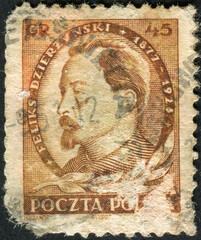 POLAND - CIRCA 1951: Postage stamp printed in Poland, shows portrait of Feliks Dzierzynski - obrazy, fototapety, plakaty