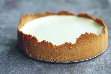 Slice Of Classical New York Cheesecake On White Plate. Closeup View. High quality photo.