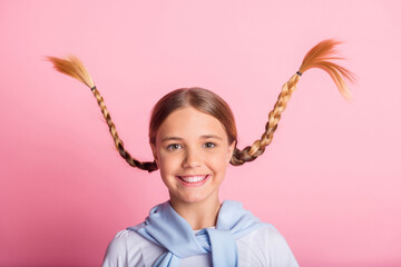Portrait of optimistic girl braids up wear white t-shirt sweater isolated on pink background