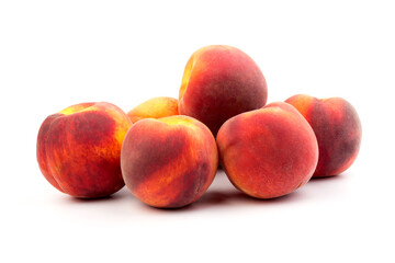 Summer fruit background. Ripe juicy peaches on white background. Copy space. Fresh organic fruit vegan food. Harvest concept