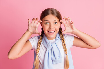 Portrait of optimistic girl show lion wear white t-shirt sweater isolated on pink color background