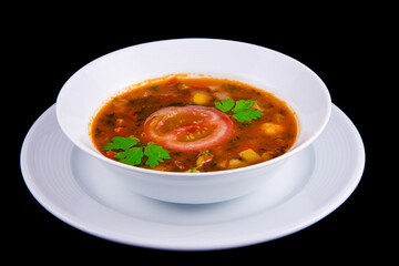 Hungarian goulash - thick vegetable soup with beef and tomatoes