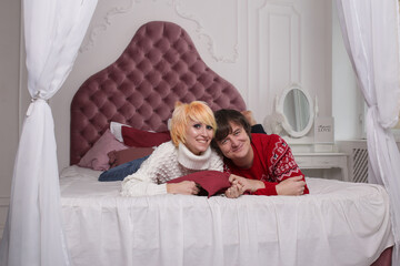Cheerful romantic couple laughing, enjoying free time together joking