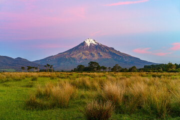 Fototapeta premium sunset at cone volcano mount taranaki, new zealand