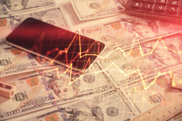 Double exposure of forex graph drawing over us dollars bill background. Concept of financial markets.