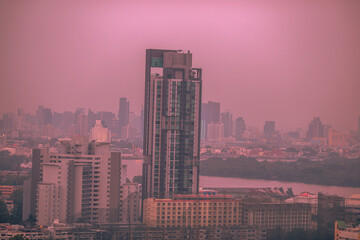 panoramic high-angle evening background of the city view,with natural beauty and blurred sunsets in the evening and the wind blowing all the time,showing the distribution of city center accommodation