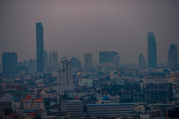 panoramic high-angle evening background of the city view,with natural beauty and blurred sunsets in the evening and the wind blowing all the time,showing the distribution of city center accommodation