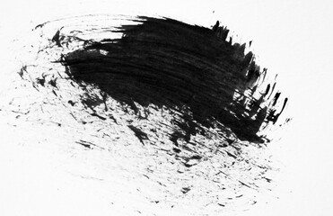 Black watercolor brush stroke on white background