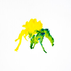 Yellow and green watercolor splashes on the white background