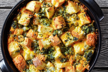 Italian strata on a black baking dish, top view