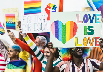 Happy Multiracial people celebrating gay pride event - Group of friends with different age and race...
