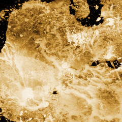 Gold ink and watercolor texture on white paper background. Paint leaks and decalcomania effects. Hand-painted gouache abstract image. Mess on the canvas.