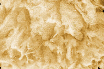 Gold ink and watercolor texture on white paper background. Paint leaks and decalcomania effects. Hand-painted gouache abstract image. Mess on the canvas.