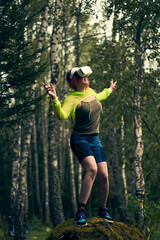 Woman goes into virtual reality using virtual reality headset.