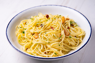Espaguetis aglio olio traditional recipe from Italy.