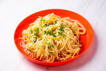 Espaguetis aglio olio traditional recipe from Italy.