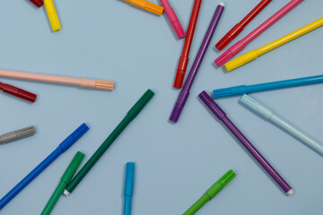 Multicolored Felt-Tip Pens isolated on a blue background