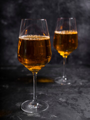 amber or orange wine made from white grapes. in a tall wine glass. Georgian national wine according to old technology