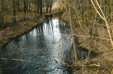River in Germany forest, autumn and winter weather