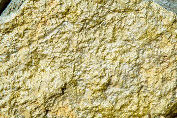 texture of stone painted with gold paint