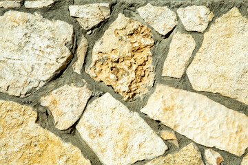 Stone wall texture. Stone wall as background or texture. Part of a stone wall, for background or texture