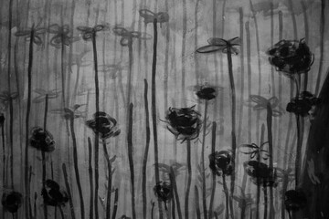 evocative black and white texture image of tulips painted on the wall

