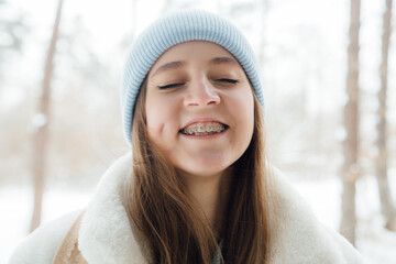 beautiful girl with braces smiling