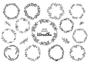 Vintage set of hand drawn rustic wreaths. Floral graphic on white board. Nature design elements